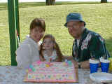 Karen, Al, and Anna at Anna's birthday