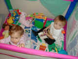 Angeline with her friend Julia in one of those rare ocassions where you can catch her inside a playpen