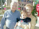 With her grandparents Manolo and Julie